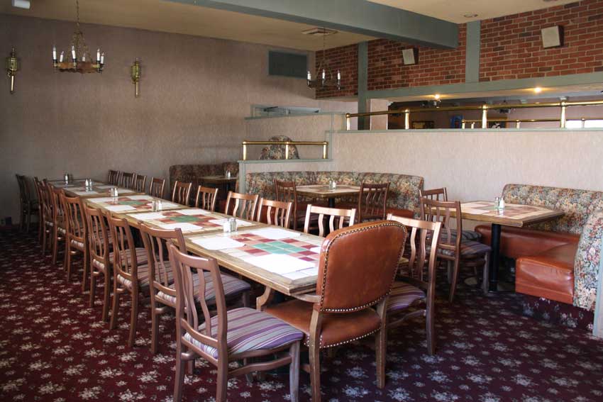 Long tables set for a banquet